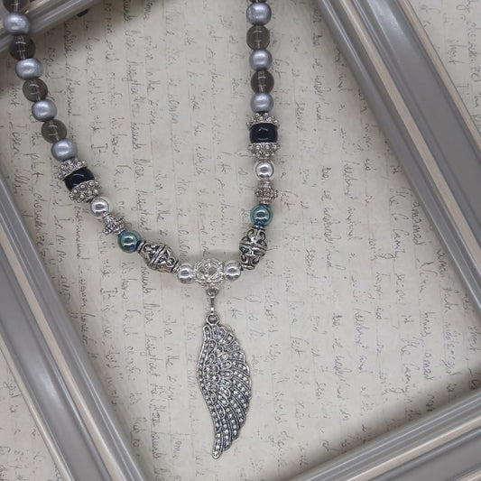 Angel Wing choker silver hematite with glass and wood beads.